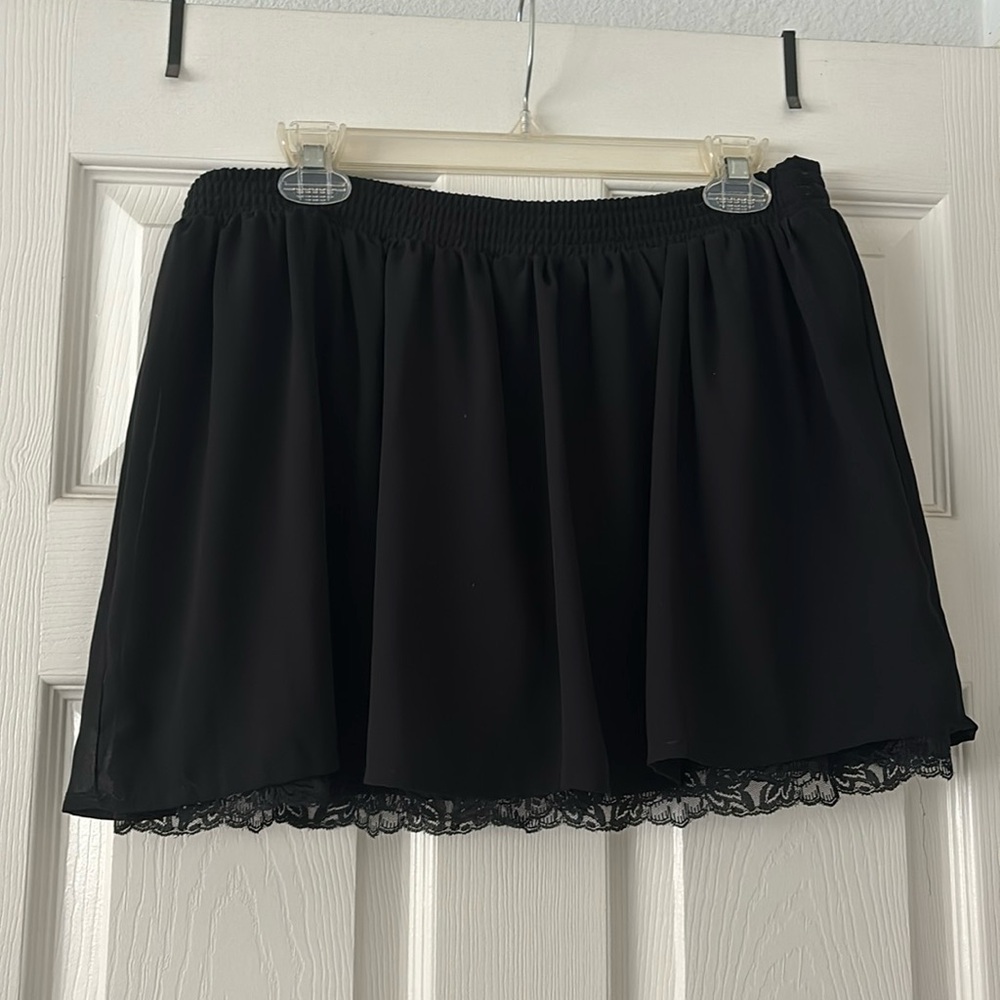 Black skirt with lace underlayer